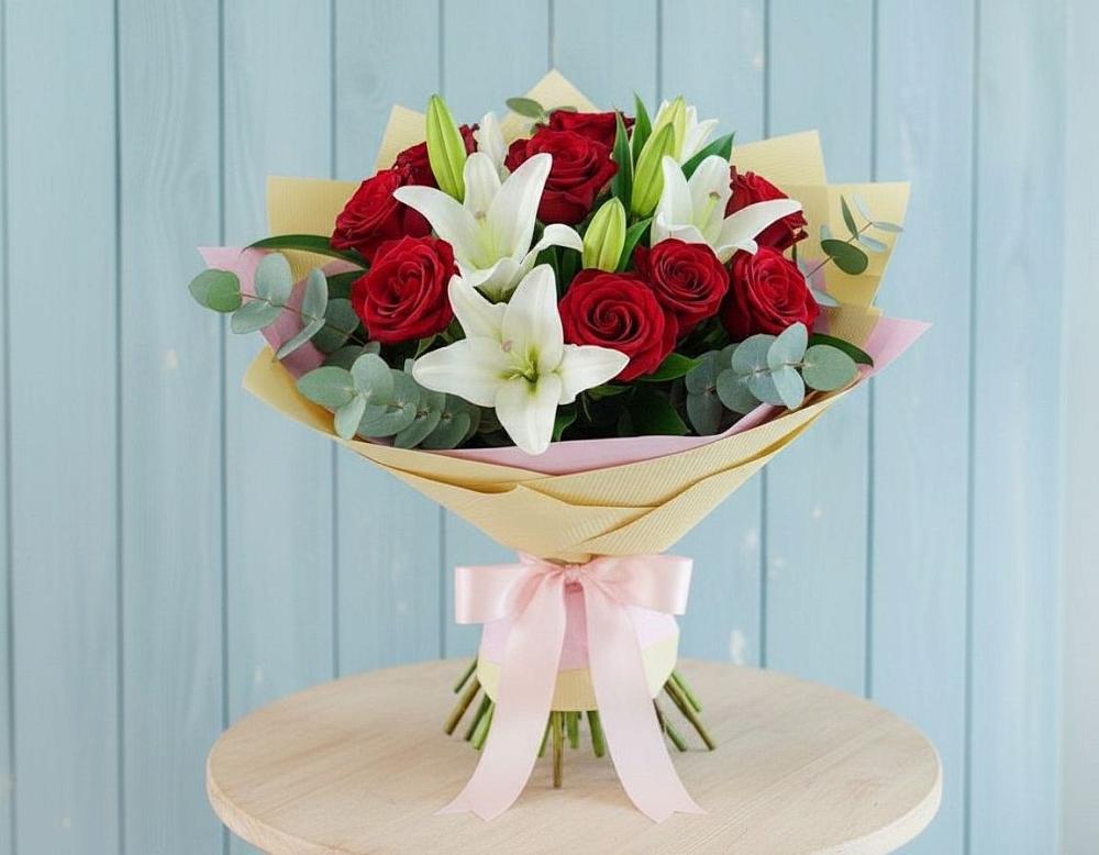 Букет цветов из: Лилии и Розы в Небуге